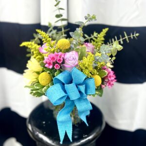 Brighten any moment with “Sunny Surprise” from Flowerland Florist in Sulphur Springs, TX. Featuring vibrant yellow roses and cheerful blooms with fresh greenery, this uplifting arrangement is perfect for birthdays, get well, or just because. Local delivery available.