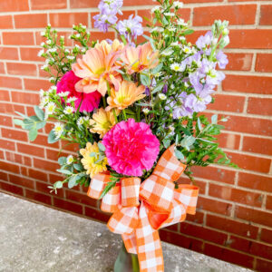 Brighten any space with the “Sunny Day Bud Vase” from Flowerland Florist in Sulphur Springs, TX. Featuring a fresh, seasonal mix of cheerful blooms, this petite arrangement is perfect for desks, hospital rooms, or sending a little sunshine. Local delivery available.