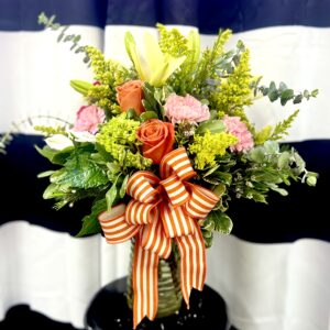 Bring warmth and whimsy with “Daydream” from Flowerland Florist in Sulphur Springs, TX. A vibrant mix of yellow and orange blooms, this cheerful arrangement is perfect for celebrating, encouraging, or simply making someone smile. Local delivery available.