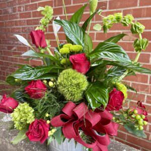 Send heartfelt sympathy with our rustic rose vase arrangement from Flowerland Florist in Sulphur Springs, TX. Featuring fresh roses in a charming rustic container—perfect for funerals, memorials, or condolence gifts. Local delivery available.