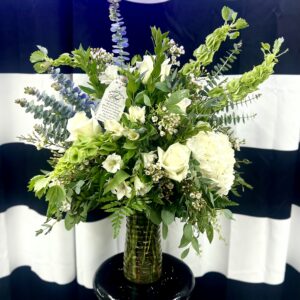 Offer comfort and peace with “Feather from an Angel” from Flowerland Florist in Sulphur Springs, TX. A serene sympathy arrangement in soft whites and greens, featuring a keepsake feather as a gentle reminder of love and presence. Local funeral delivery available.